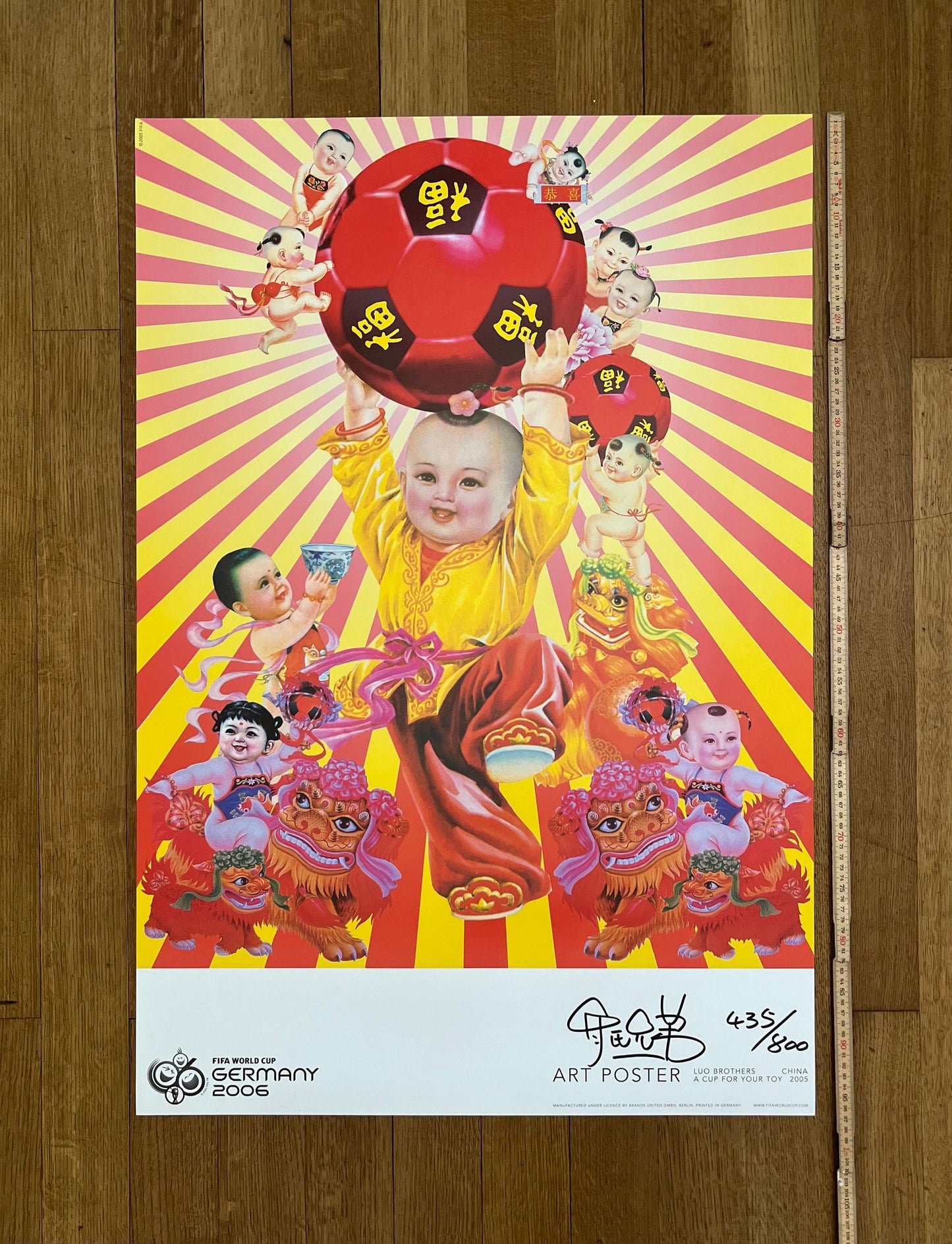 Luo Brothers  signed football poster - 26.0"×38.2" (66×97cm)